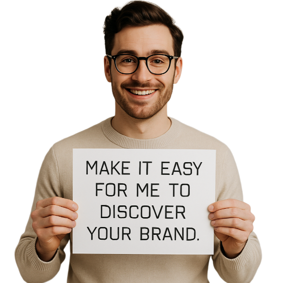 Person with sign: Arron wants to discover your brand